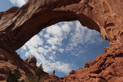 Low angle view of rock formation against sky