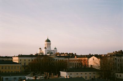 Buildings in city against sky