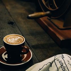 High angle view of coffee cup on table