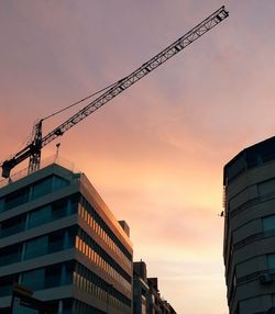 Low angle view of crane at construction site