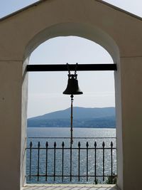 Scenic view of sea against clear sky seen through window