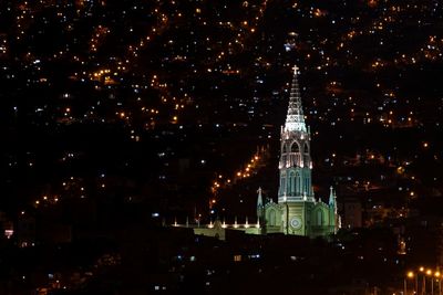 Illuminated buildings in city at night