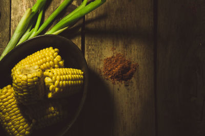 High angle view of yellow vegetables on table