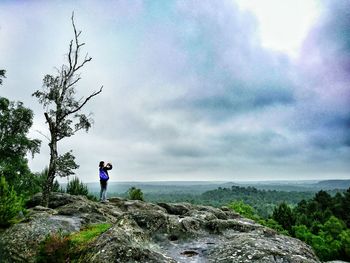 Person standing on rock