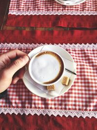 High angle view of coffee cup on table