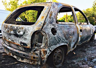 Close-up of abandoned car