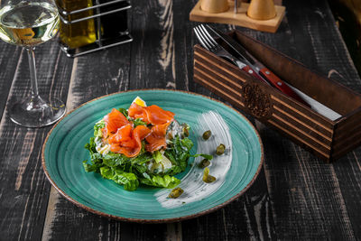 High angle view of salad in plate on table