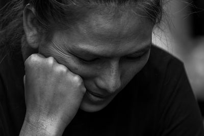 Close-up of thoughtful woman