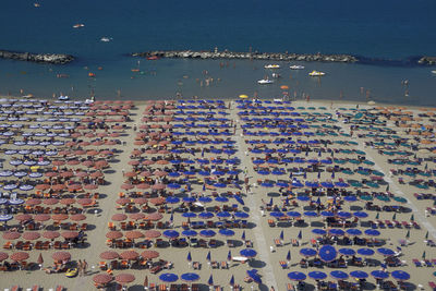 High angle view of sea against buildings in city