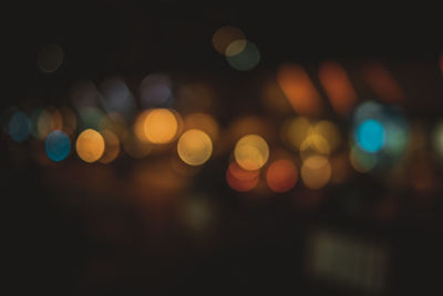 Defocused image of illuminated lights at night