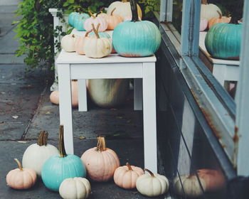 Close-up of multi colored pumpkins on table
