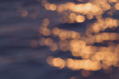 Defocused image of illuminated lights at night