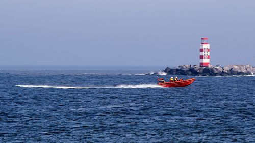 Boat sailing in sea