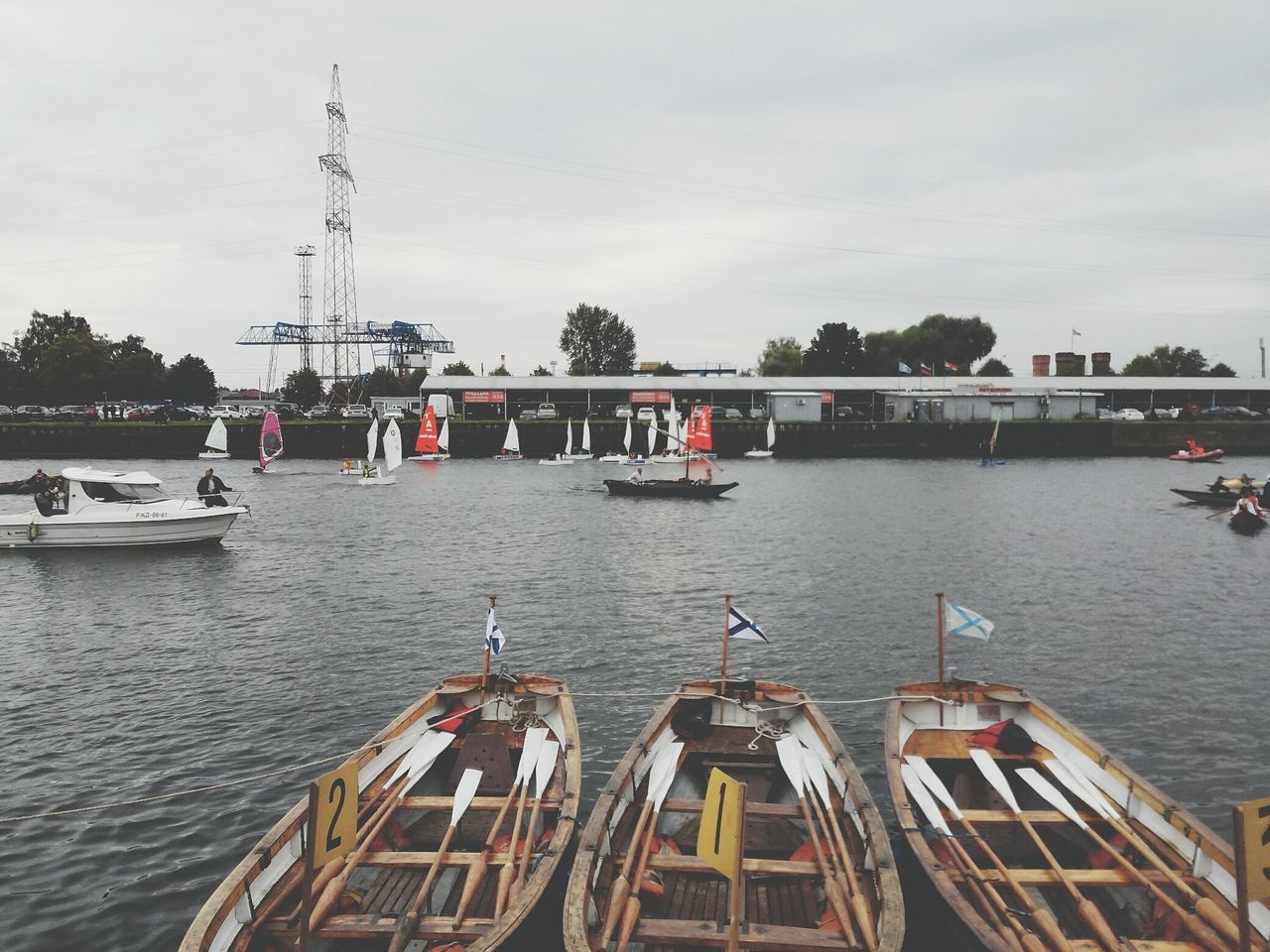 nautical vessel, transportation, mode of transport, boat, water, moored, sky, men, river, lifestyles, travel, leisure activity, sea, day, cloud - sky, nature, waterfront, outdoors, person