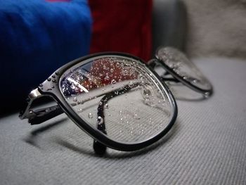 Close-up of sunglasses on table