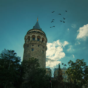 Low angle view of built structure against blue sky