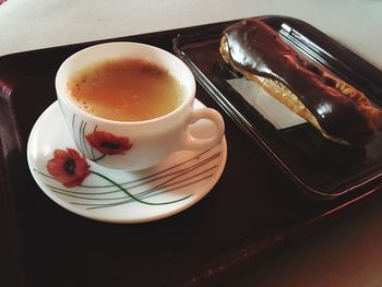 Close-up of coffee served on table