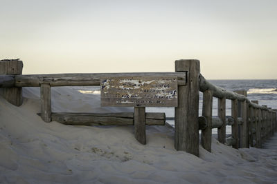 Scenic view of sea against clear sky during winter