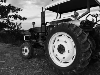 High angle view of tractor on field against sky