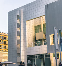 Low angle view of modern buildings against sky