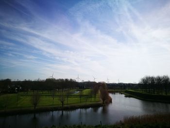 Scenic view of farm against sky