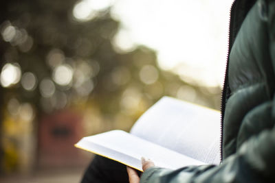 Close-up of open book at home