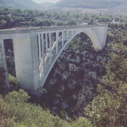 Arch bridge over river