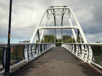 Bridge over road against sky