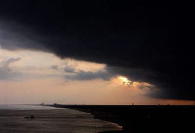 View of calm sea at sunset