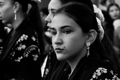 Close-up of women looking away during festival