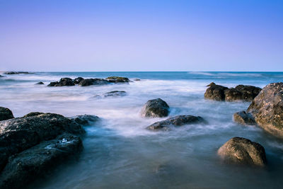 Scenic view of sea against clear sky
