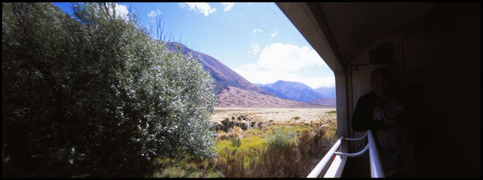 Panoramic shot of landscape seen through window