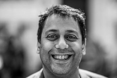 Close-up portrait of a smiling young man