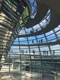 Low angle view of modern glass structure