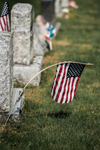 American flag drooping over a united states soldier's grave in the poconos, pennsylvania