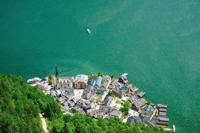 High angle view of townscape by sea