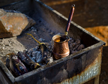 High angle view of eggplants being cooked on barbecue