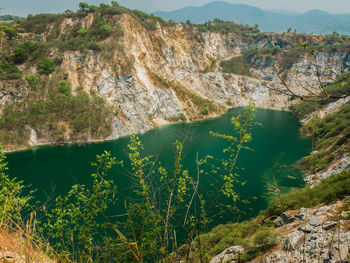 High angle view of lake amidst rocks