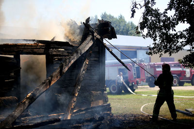 Man working on built structure