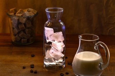 Close-up of drink in glass jar on table