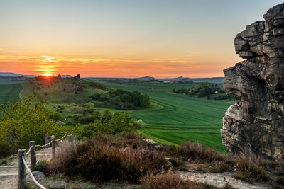 Scenic view of landscape against sky during sunset in the national park harz 