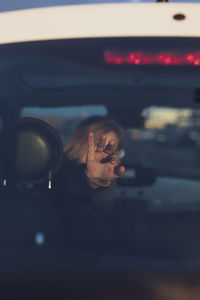 Portrait of woman in car