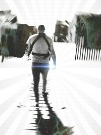 Woman standing by railing