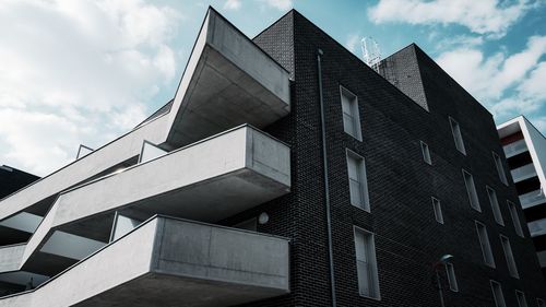 Low angle view of modern building against sky