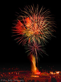 Firework display at night