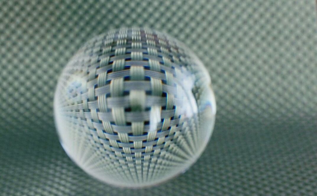 disco ball, close-up, shiny, indoors, sphere, no people, single object, arts culture and entertainment, nightlife, reflection, studio shot, geometric shape, shape, circle, nightclub, silver colored, pattern, still life, selective focus, glass - material