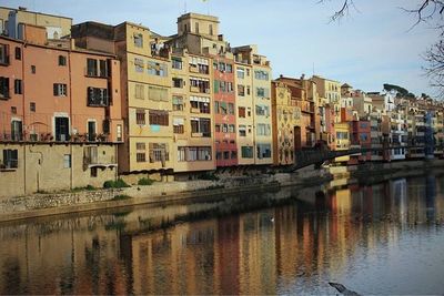 View of residential buildings by river