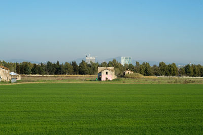 Built structure on field against clear sky