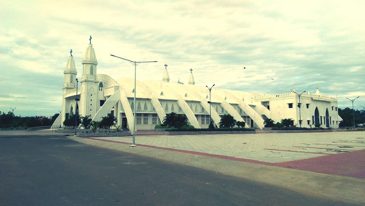 architecture, built structure, building exterior, street, sky, outdoors, road, town, no people, day, city