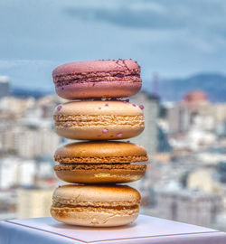 Close-up of bread on stack against blurred background